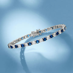 6ctw Created White & Blue Sapphire Tennis Bracelet in 14K Gold Overlay – 7.25”